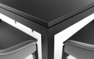 freepik__a-modern-dining-table-with-a-matte-black-tabletop-__17860